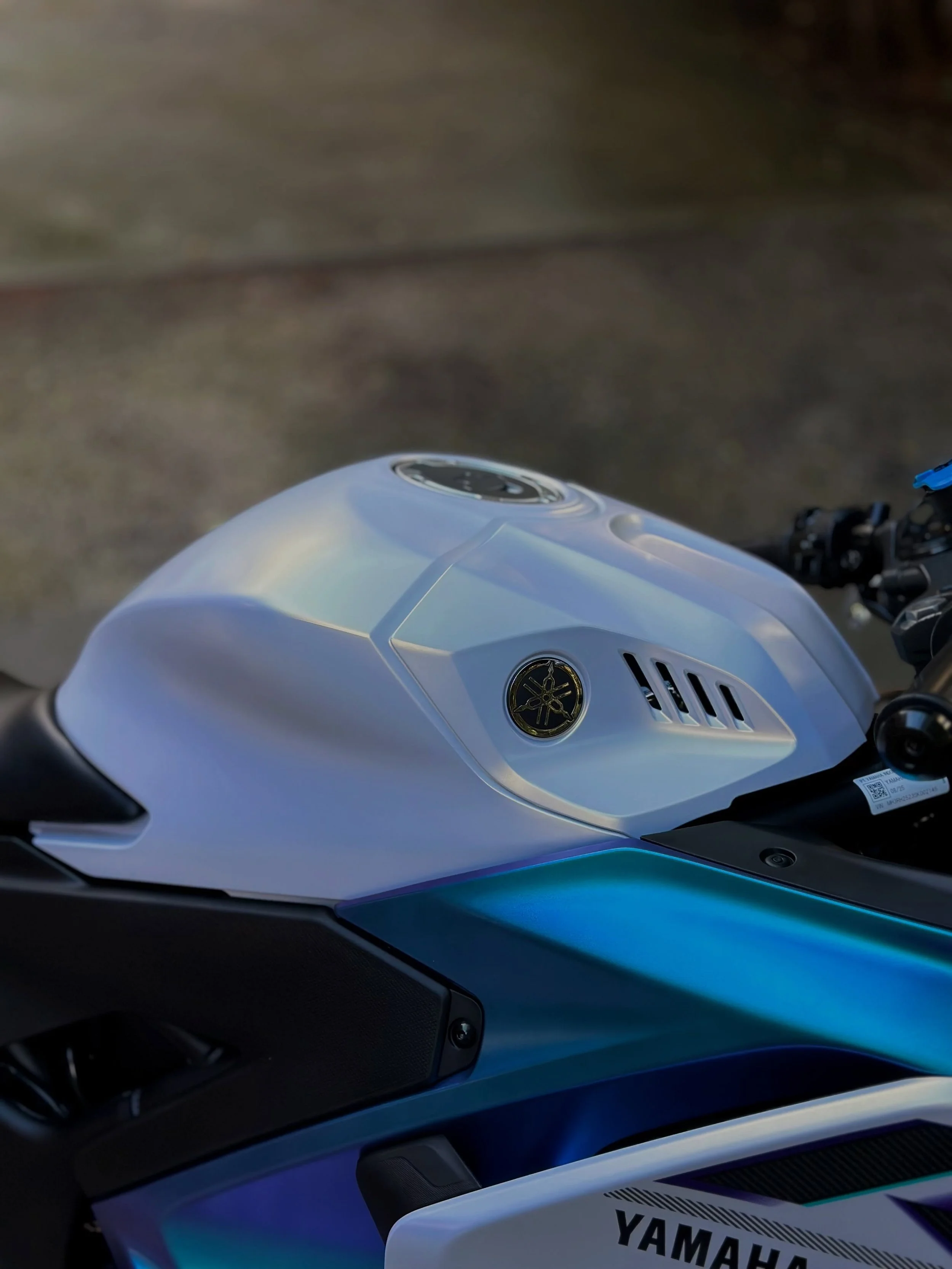 This brand new 2025 Yamaha R3 is now protected with a long-term ceramic coating package.

Matte paint can be extremely difficult to maintain and tends to fade over the years, so protecting it early is one of the best things you can do.

Now coated fo
