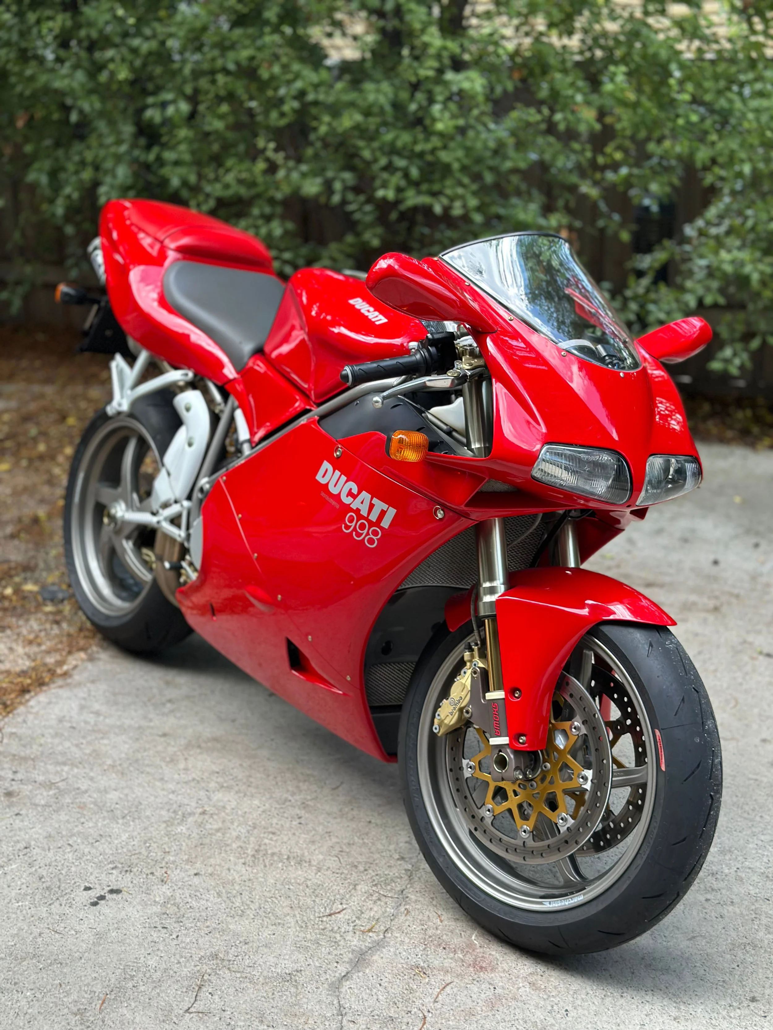 Classic red Ducati 998 professionally detailed with paint correction and ceramic coating by Curated Specialised Detailing in Melbourne