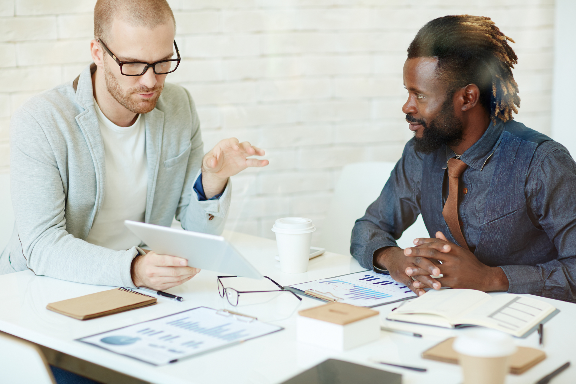 meeting in office between two project managers