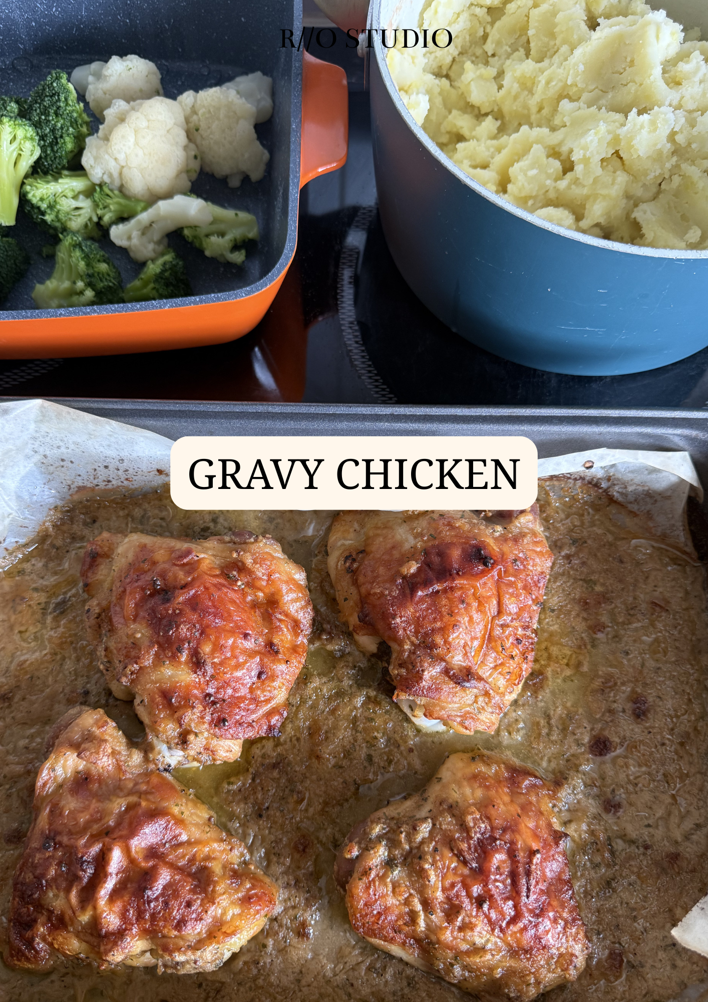 Baked chicken in a gravy sauce served with cauliflower and broccoli with salted mashed potatoes
