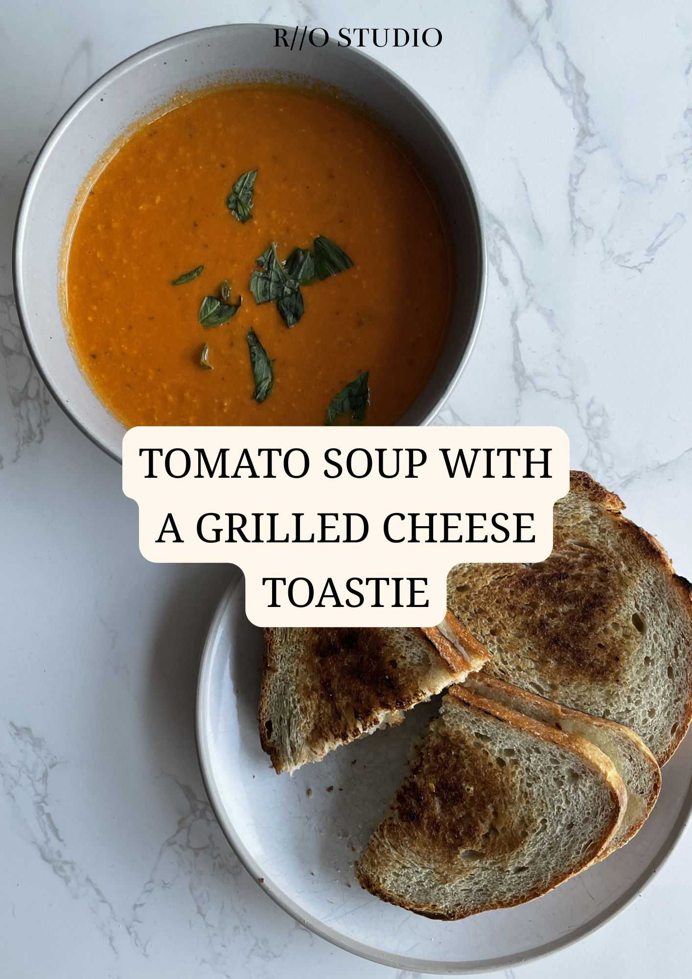 Tomato soup with a grilled cheese toastie, mustard and cheddar cheese and ham 