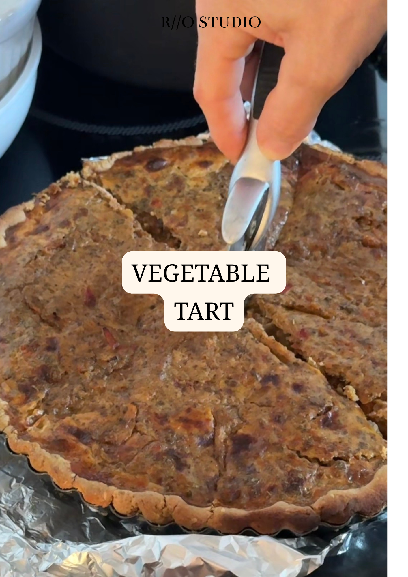A rich vegetable tart filled with succulent vegetables such as carrots and broccoli with a yogurt dressing and filling with a shortbread crust pastry