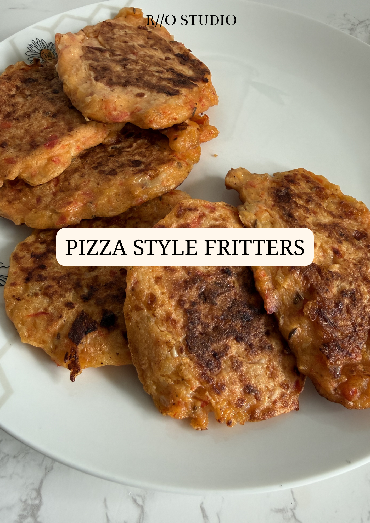 Pizza style fritters with vegetables like mushrooms and onion served with a garlic mayonnaise dip sauce 
