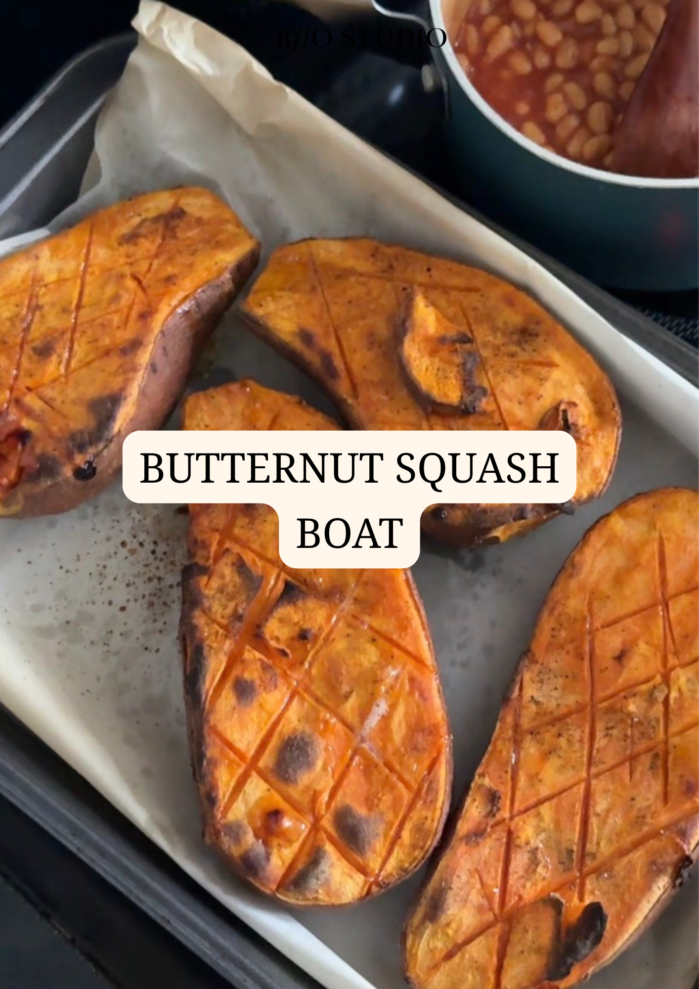 Butternut squash boat stuffed with butter, baked beans and cheddar cheese sprinkled with olive oil