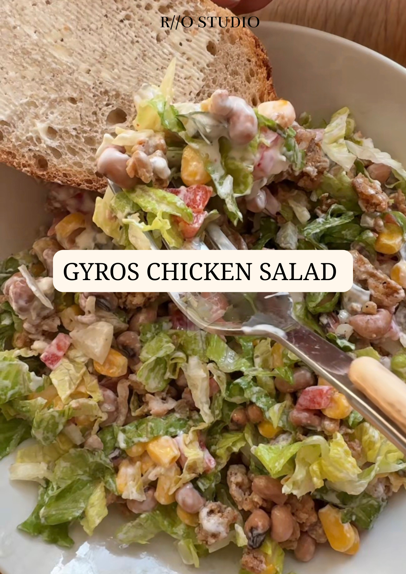 Gyros chicken salad with shredded chicken mince, corn, lettuce, gherkins, mayonnaise and yogurt dressing 