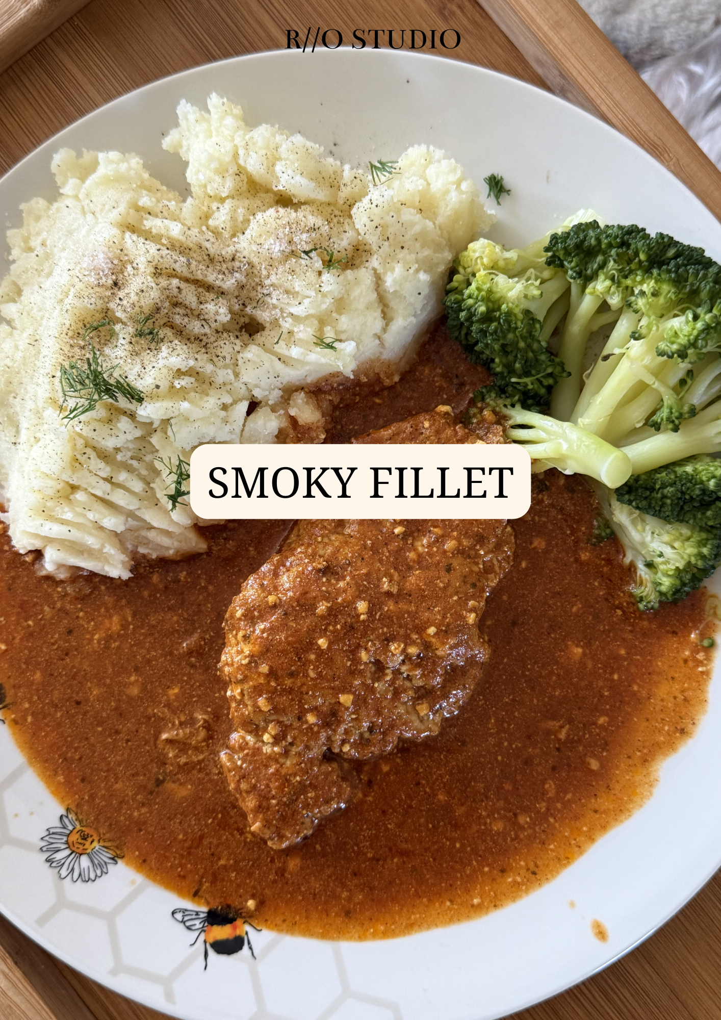 Smoky fillet in a rich barbecue sauce served with mashed potatoes and broccoli on the side 