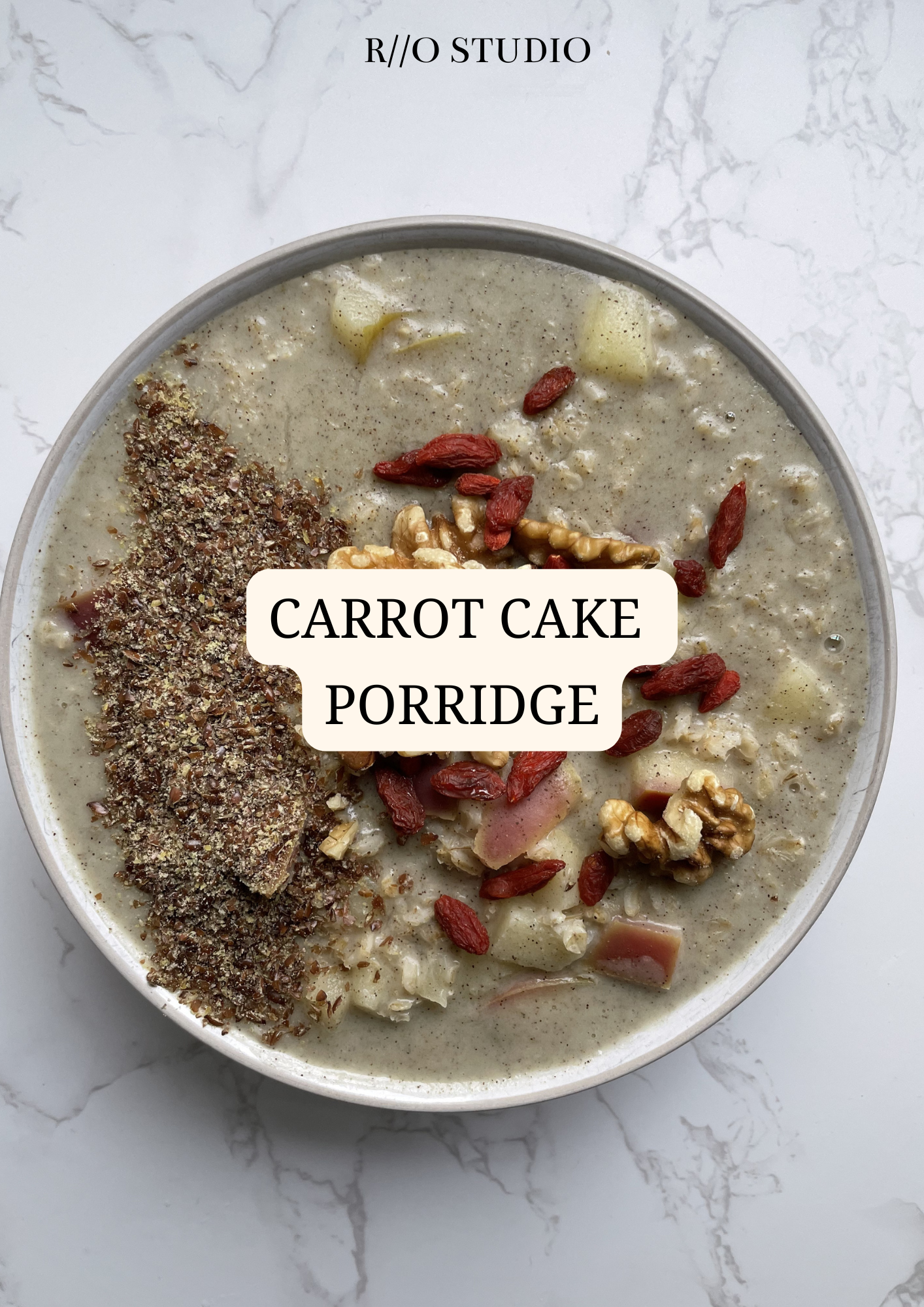 Carrot cake porridge with topped goji berries, walnuts, flaxseeds and nut butter 