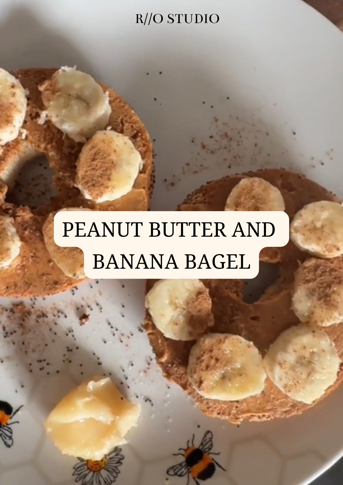 A peanut butter and banana bagel with honey and cinnamon