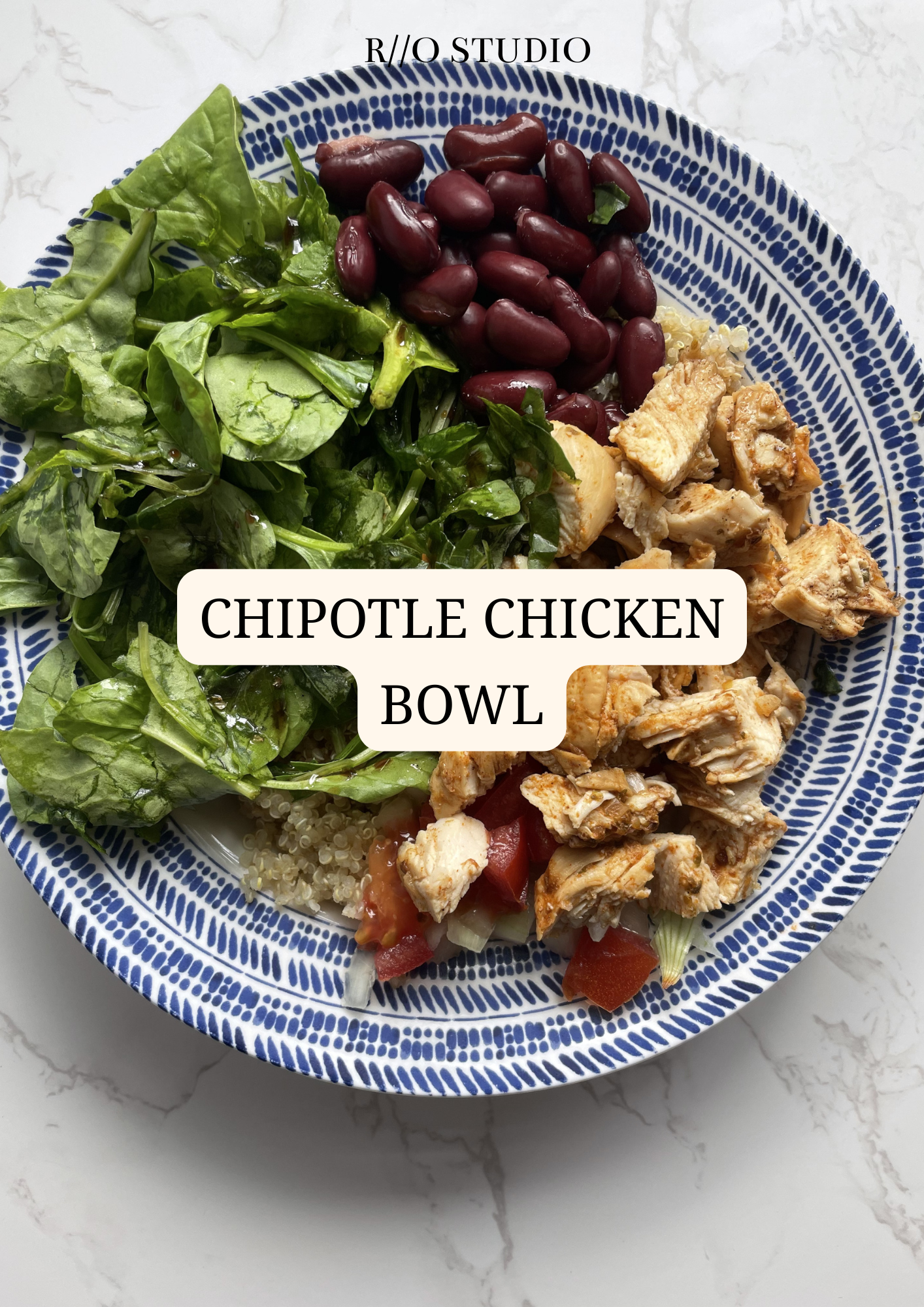 Chipotle chicken bowl with diced chicken, beans, tomatoes, corn and a mayonnaise sauce