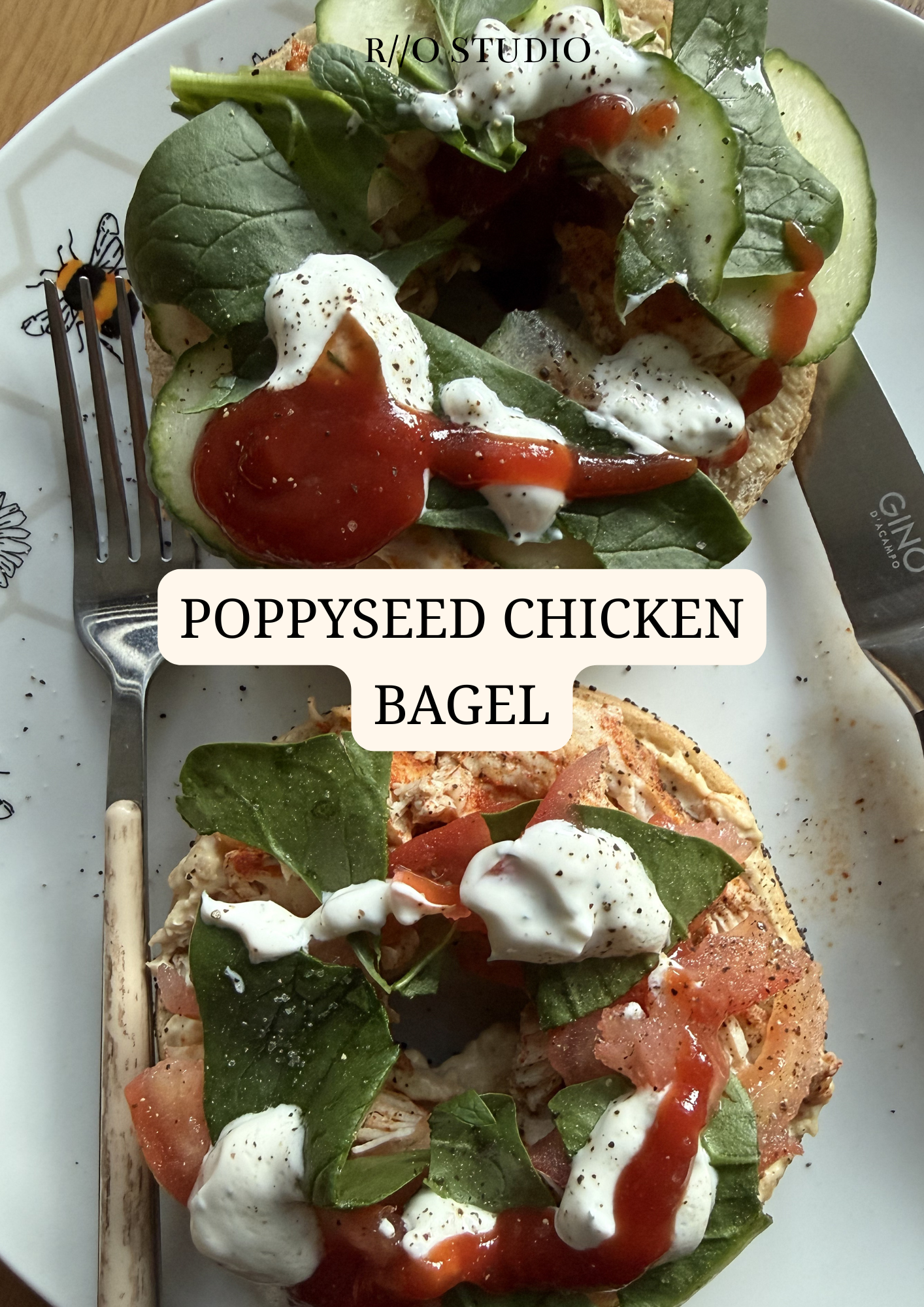 Poppyseed chicken bagel layered with hummus, vegetables and ketchup and garlic mayo 