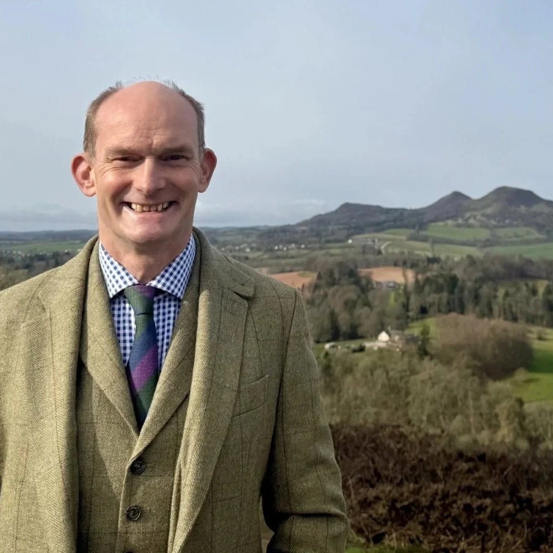 Hugo Clark in front of the Eildon Hills