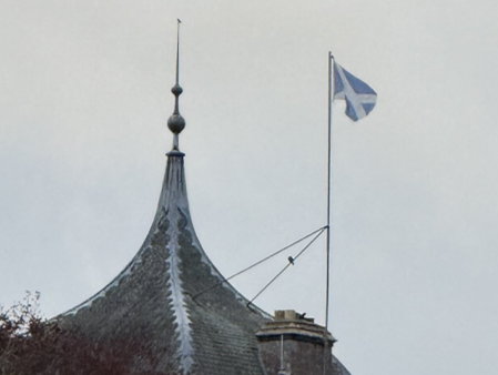 The Saltire Cross of St Andrew, Scotland’s national flag, flies proudly above Thirlestane Castle