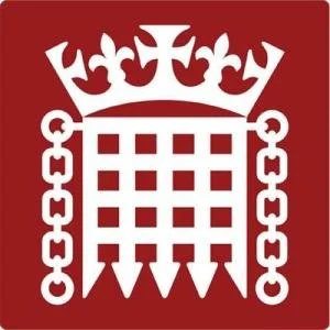 NADSN | National Association of Disabled Staff Networks | The Official Emblem of the UK Parliament, a White Portcullis Topped With a Crown on a Dark Red Background