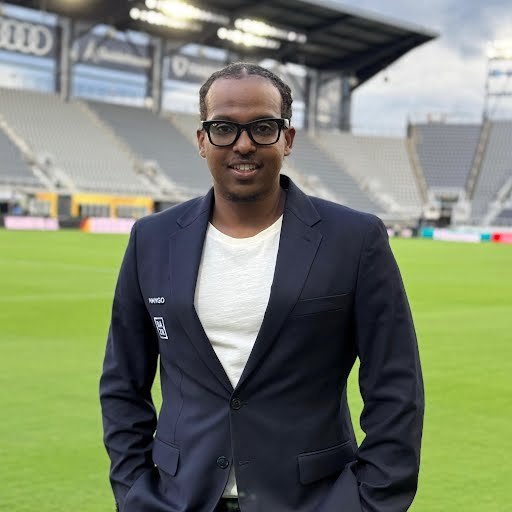 MASTER TESFATSION, AWARD-WINNING SPORTS JOURNALIST
