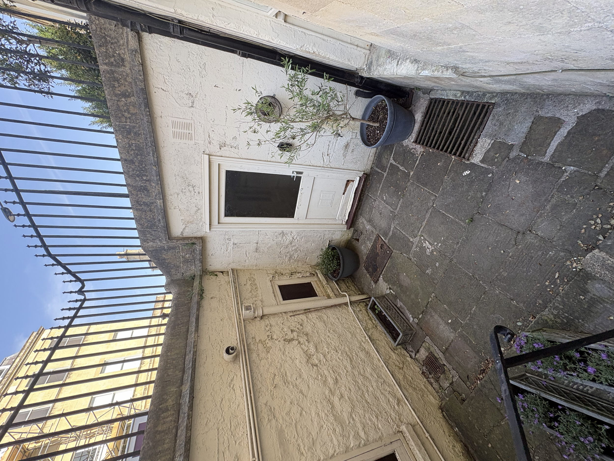 Before: Side courtyard