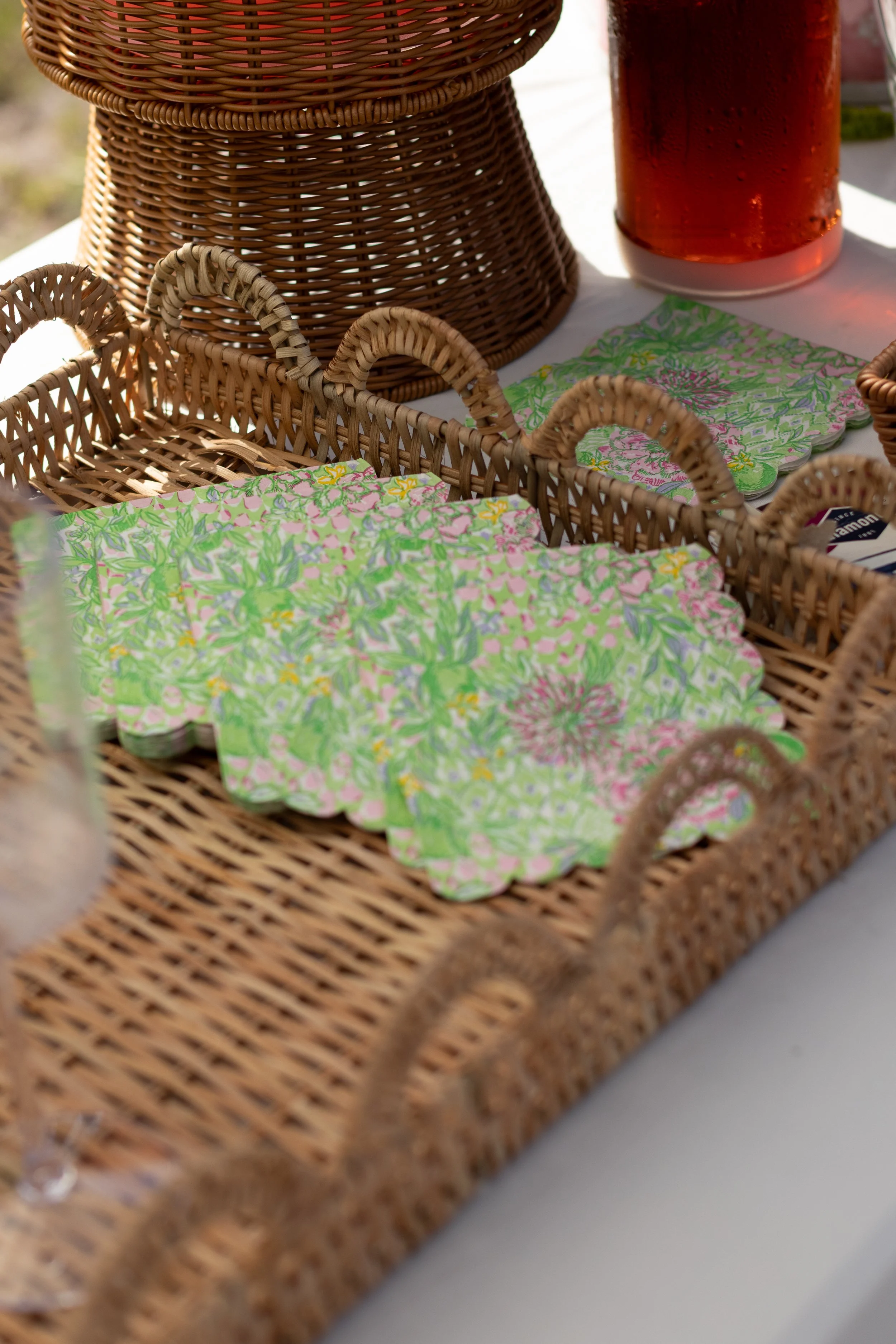Table with Rattan Tray , and green napkins