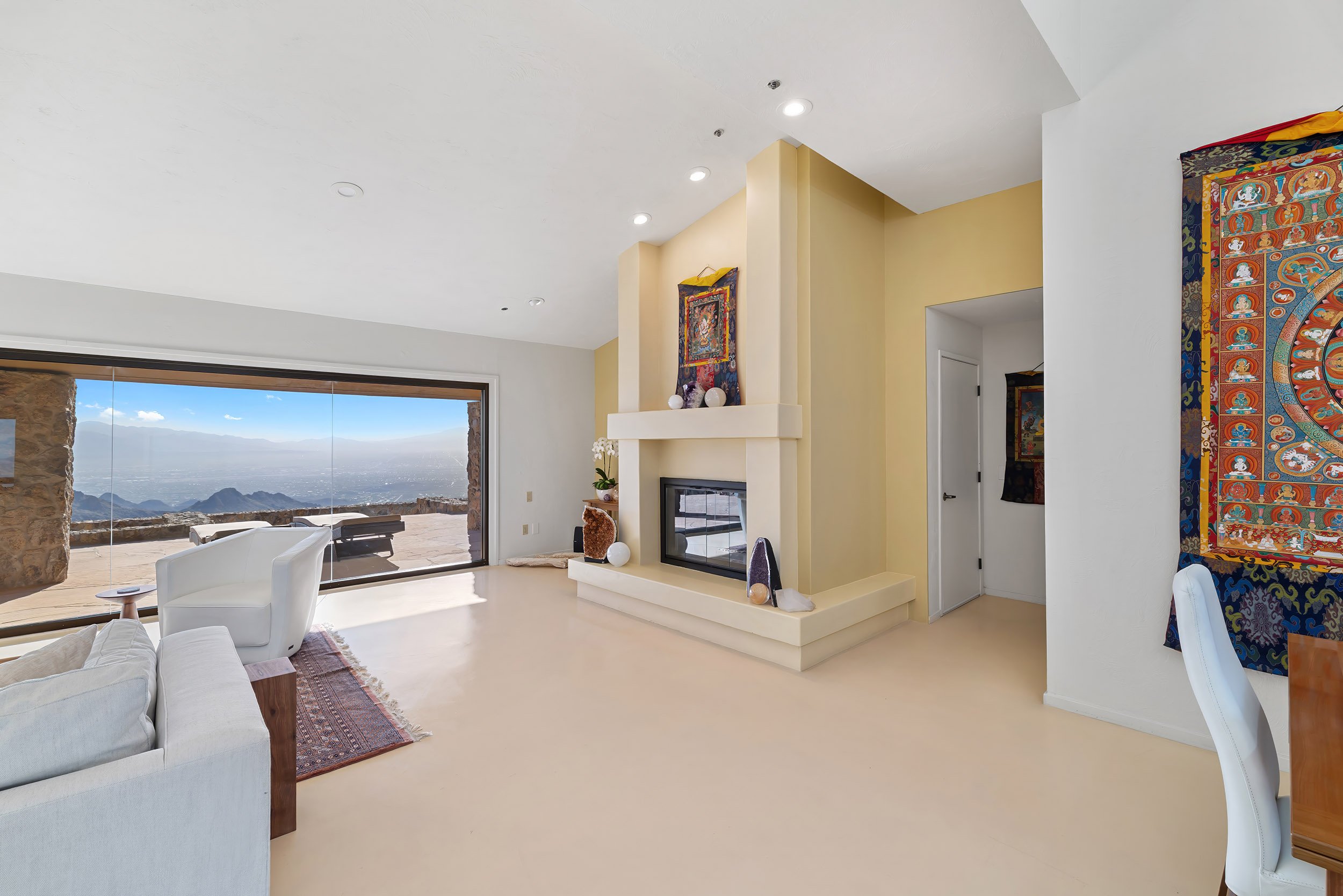 Living and dining areas at 6931 W Sky Canyon Drive, available for sale.