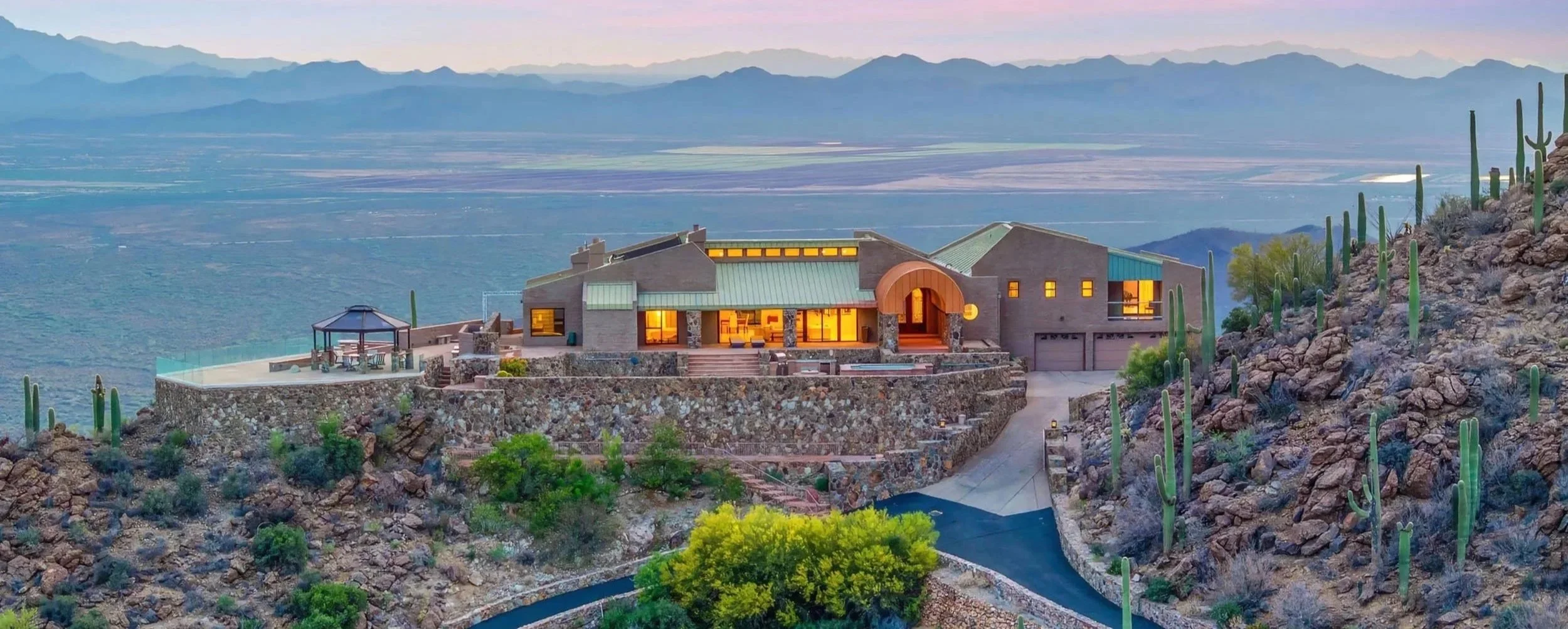 View of 6931 W Sky Canyon Drive from the east.