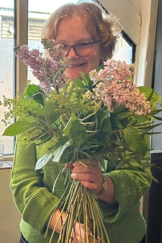 Florist making a handtied bouquet