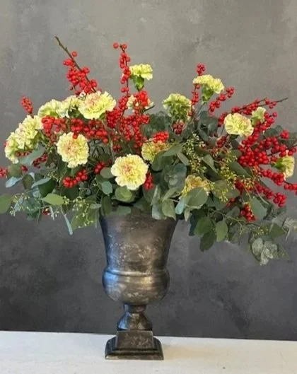 Urn with yellow Carnations, Eucalyptus and berries