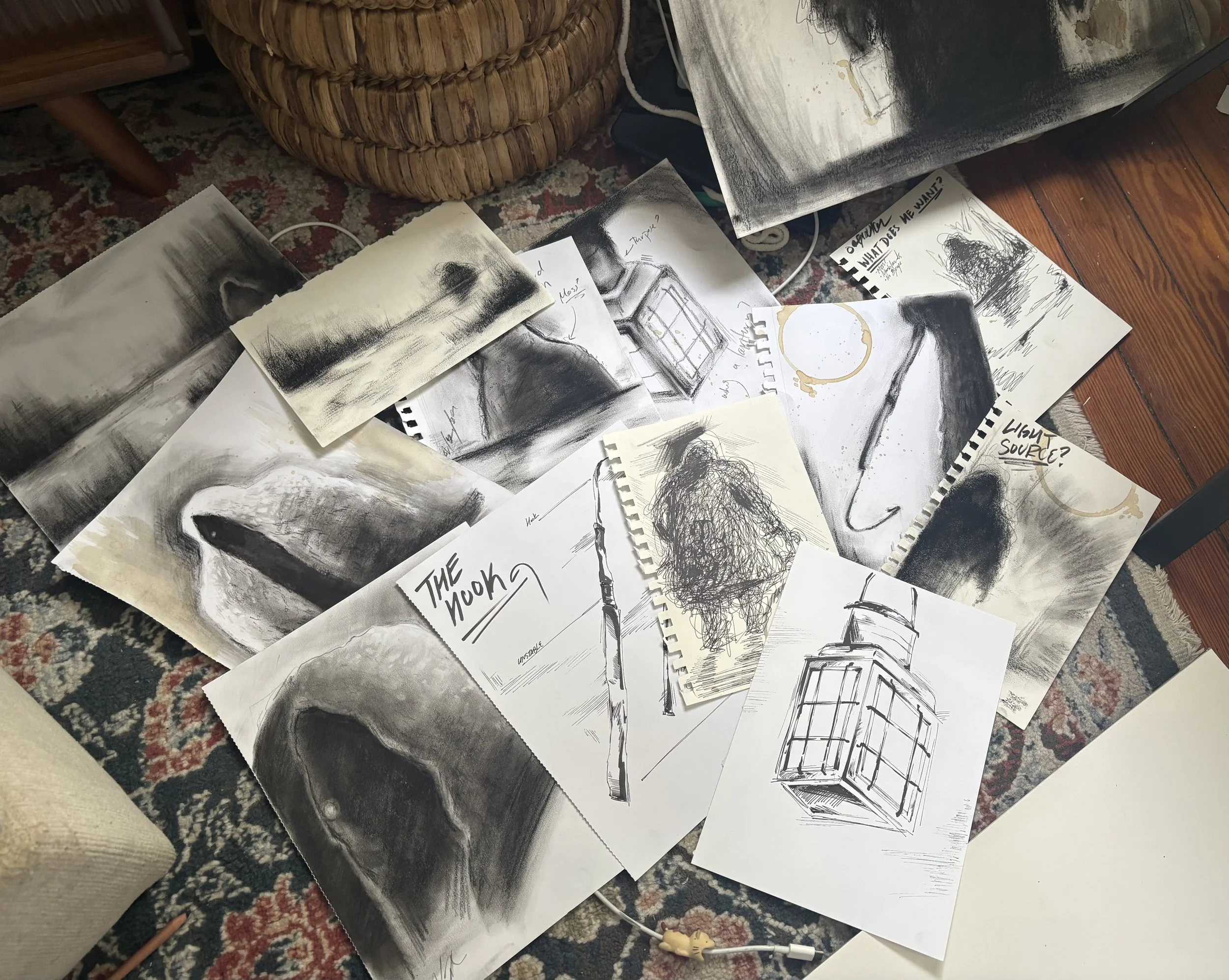 Charcoal, ink, and graphite sketches
