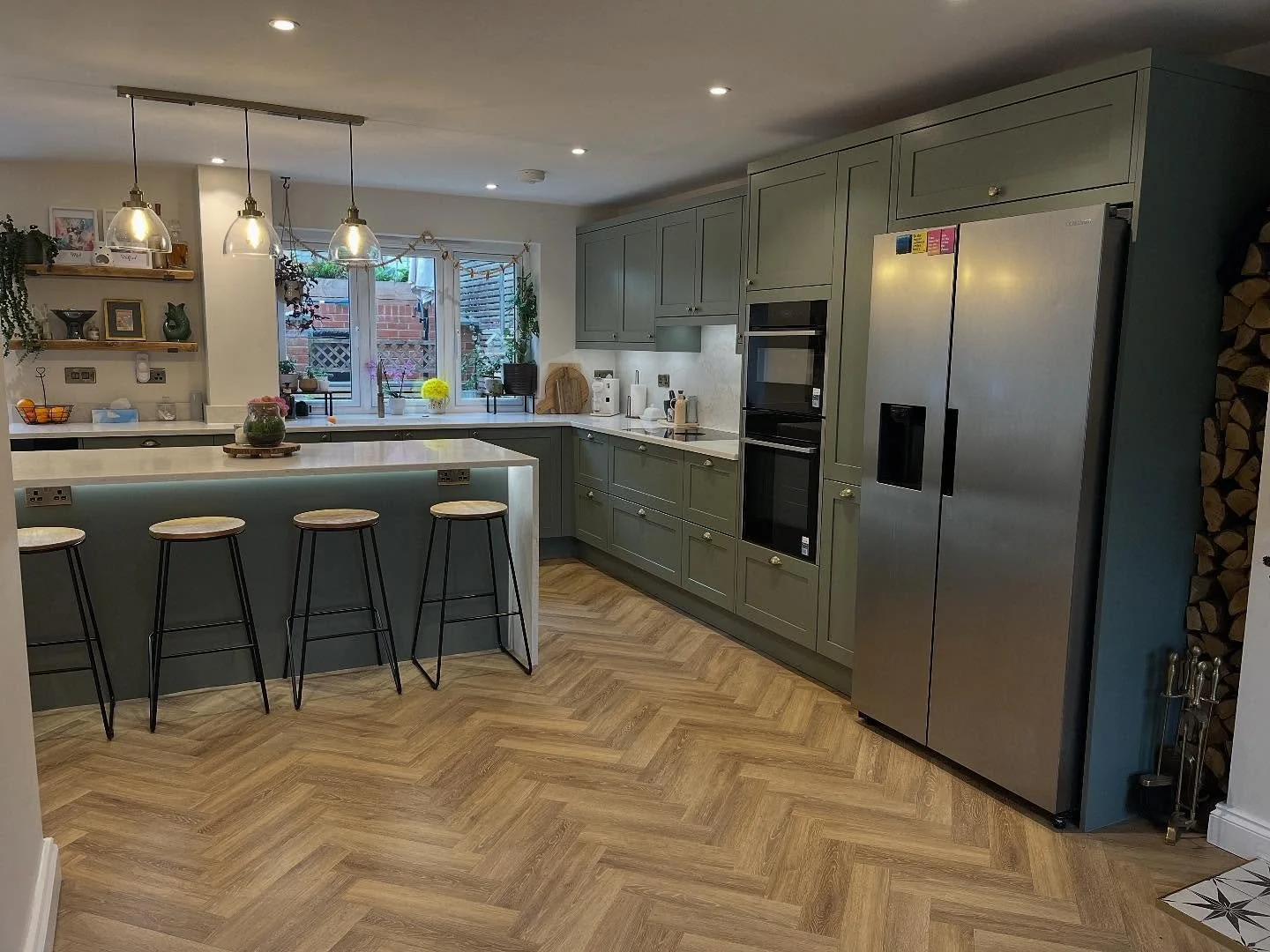✨ Another dream kitchen brought to life!
We loved creating this stunning space &mdash; featuring soft sage cabinetry, a sleek quartz worktop, and a statement breakfast bar with ambient lighting. The herringbone flooring ties it all together perfectly