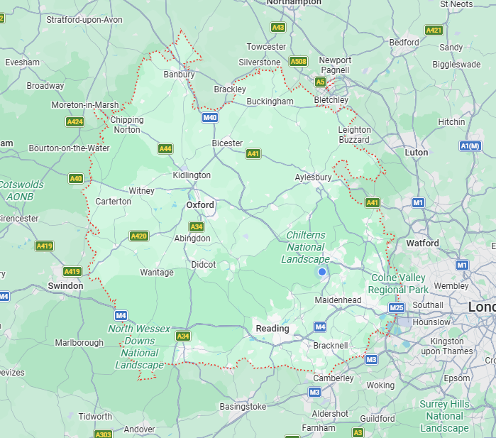 Map of southern England showing towns, roads, parks, and national landscapes including Chilterns, North Wessex Downs, and Surrey Hills.