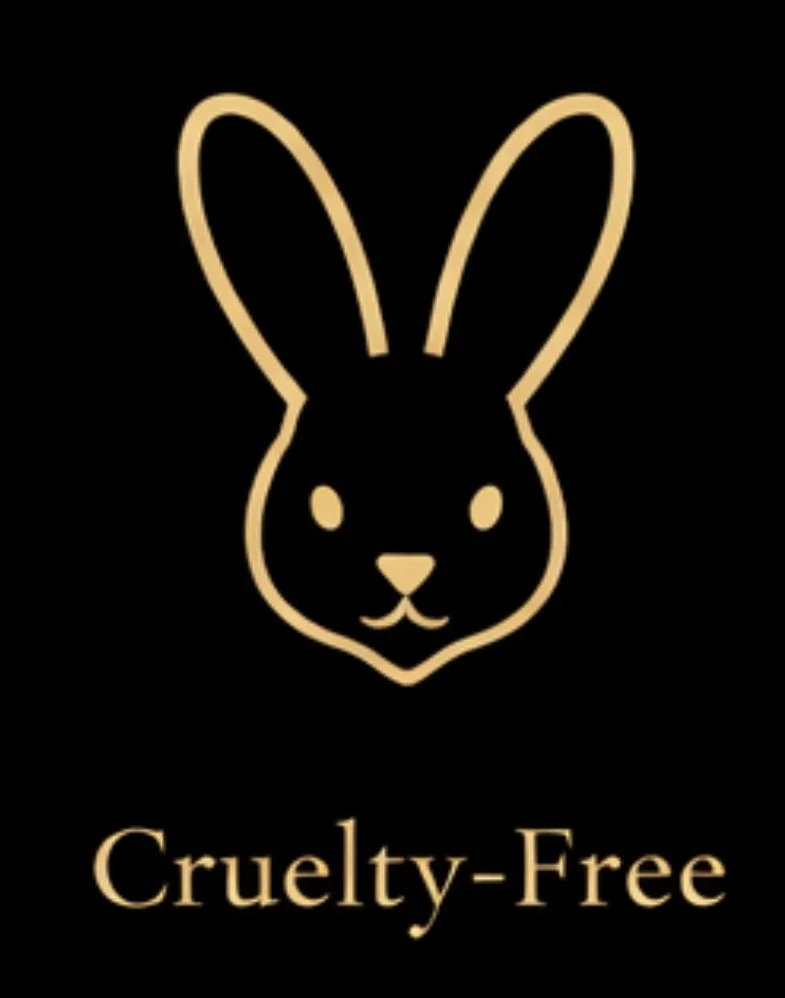 A gold outline of a rabbit's face with the words "Cruelty-Free" underneath on a black background.