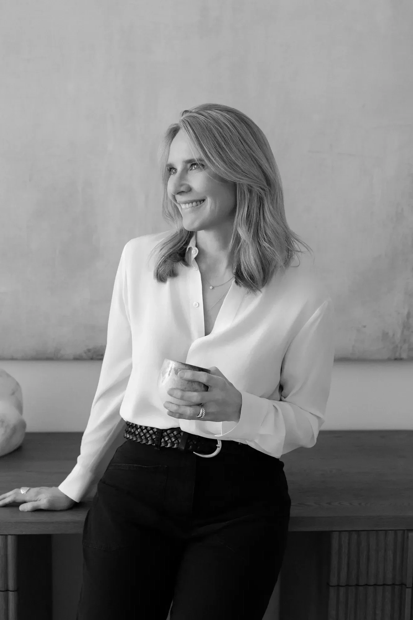 Eating disorder therapist Jennifer Warpool smiling. Photo is in black and white.