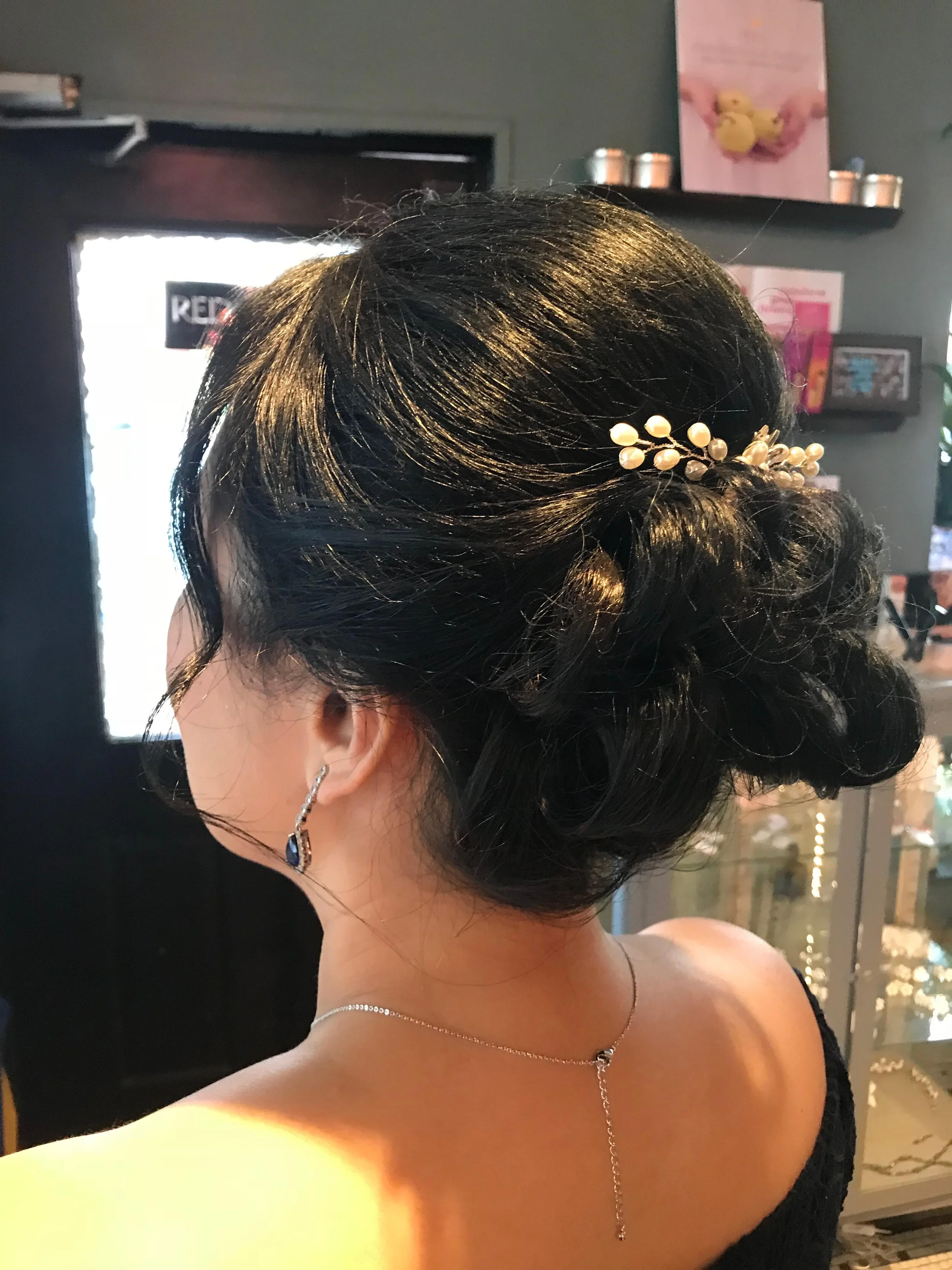 elegant updo styled by Salon 230 Daytona Beach