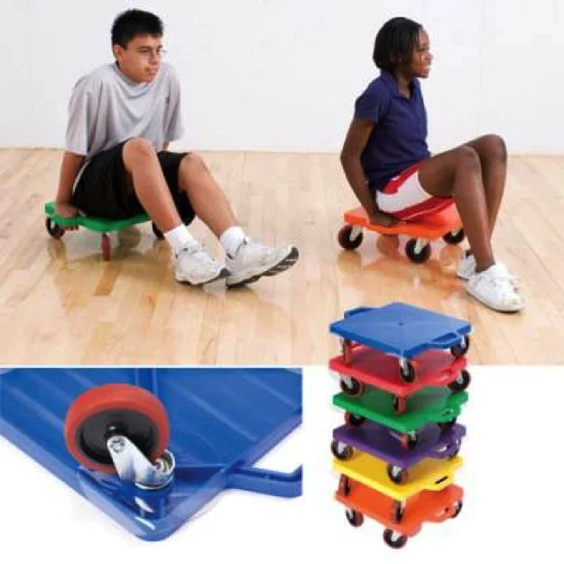 Youth sitting on top of colorful rolling pads