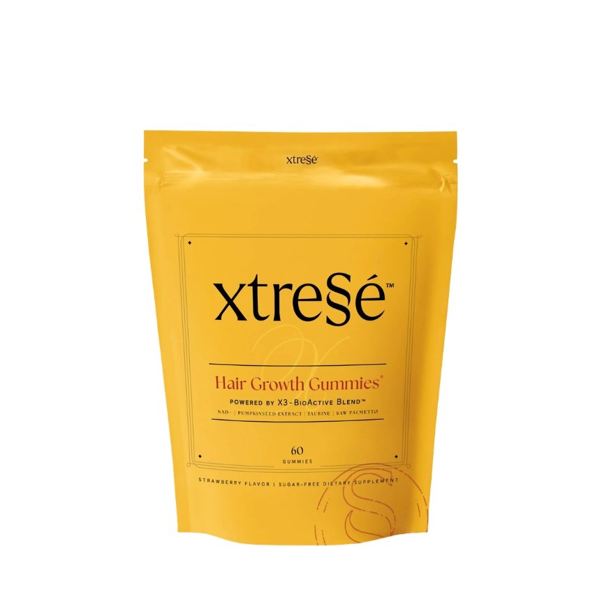 Yellow pouch of Xtresé Hair Growth Gummies with 60 gummies, strawberry flavor, sugar-free, dietary supplement, containing pumpkin seed extract, taurine, saw palmetto.