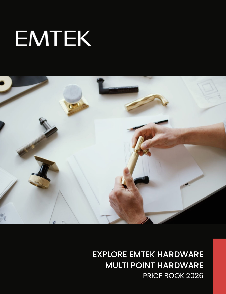 A person using a magnifying glass to examine a hardware piece on a white desk scattered with various hardware and office supplies, with black and red design elements.