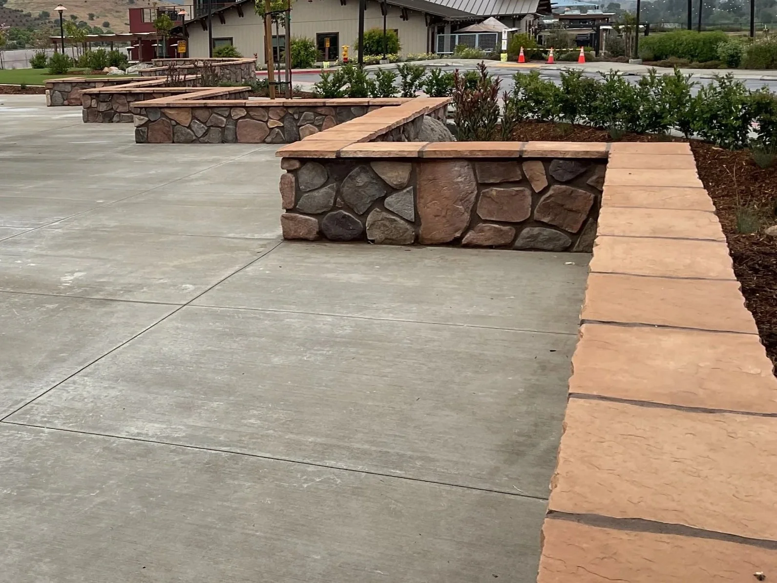Custom masonry retaining wall in san diego, ca featuring retaining wall in a zigzig pattern that creates a structured look