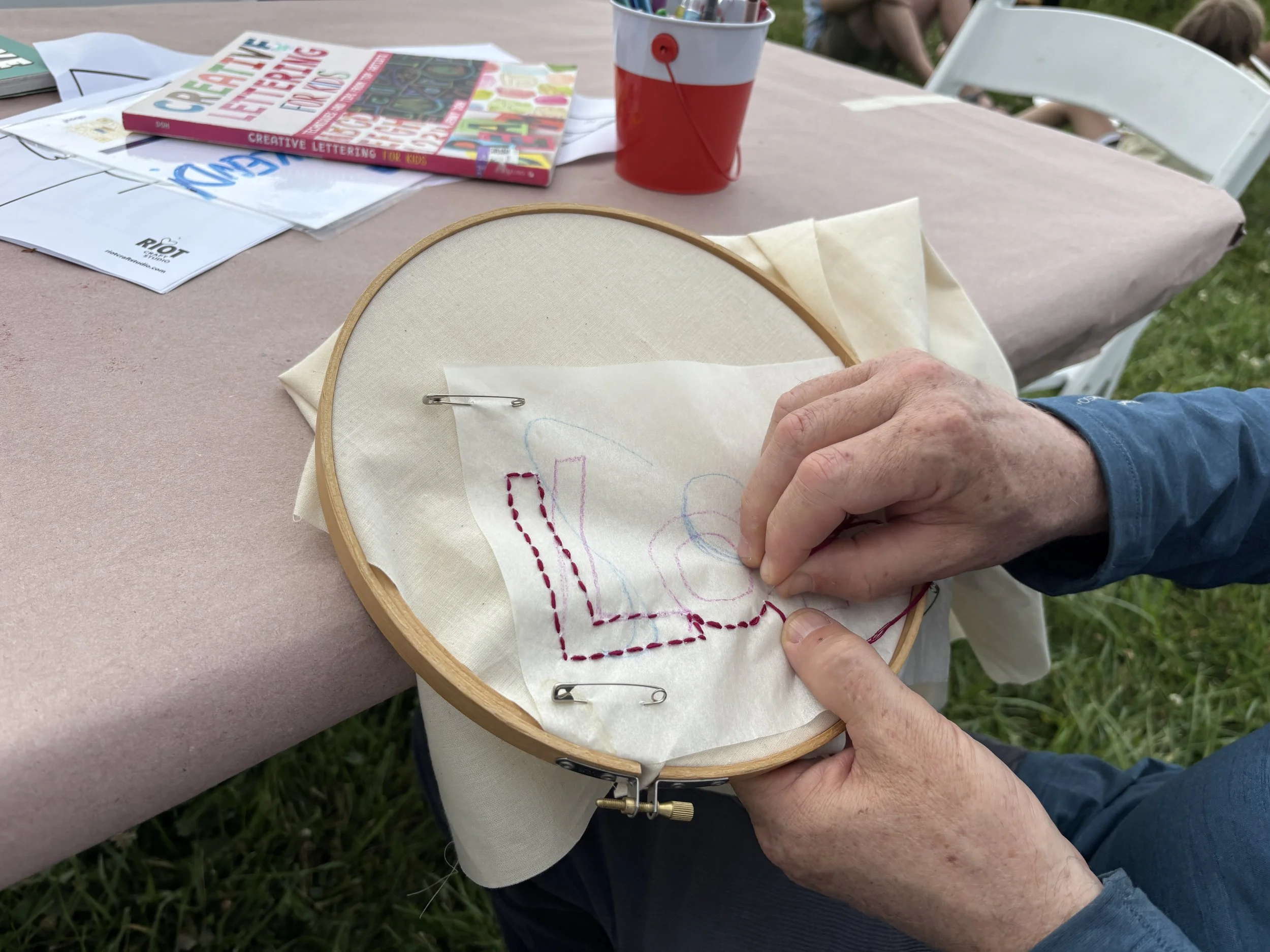 Embroidering "Love"