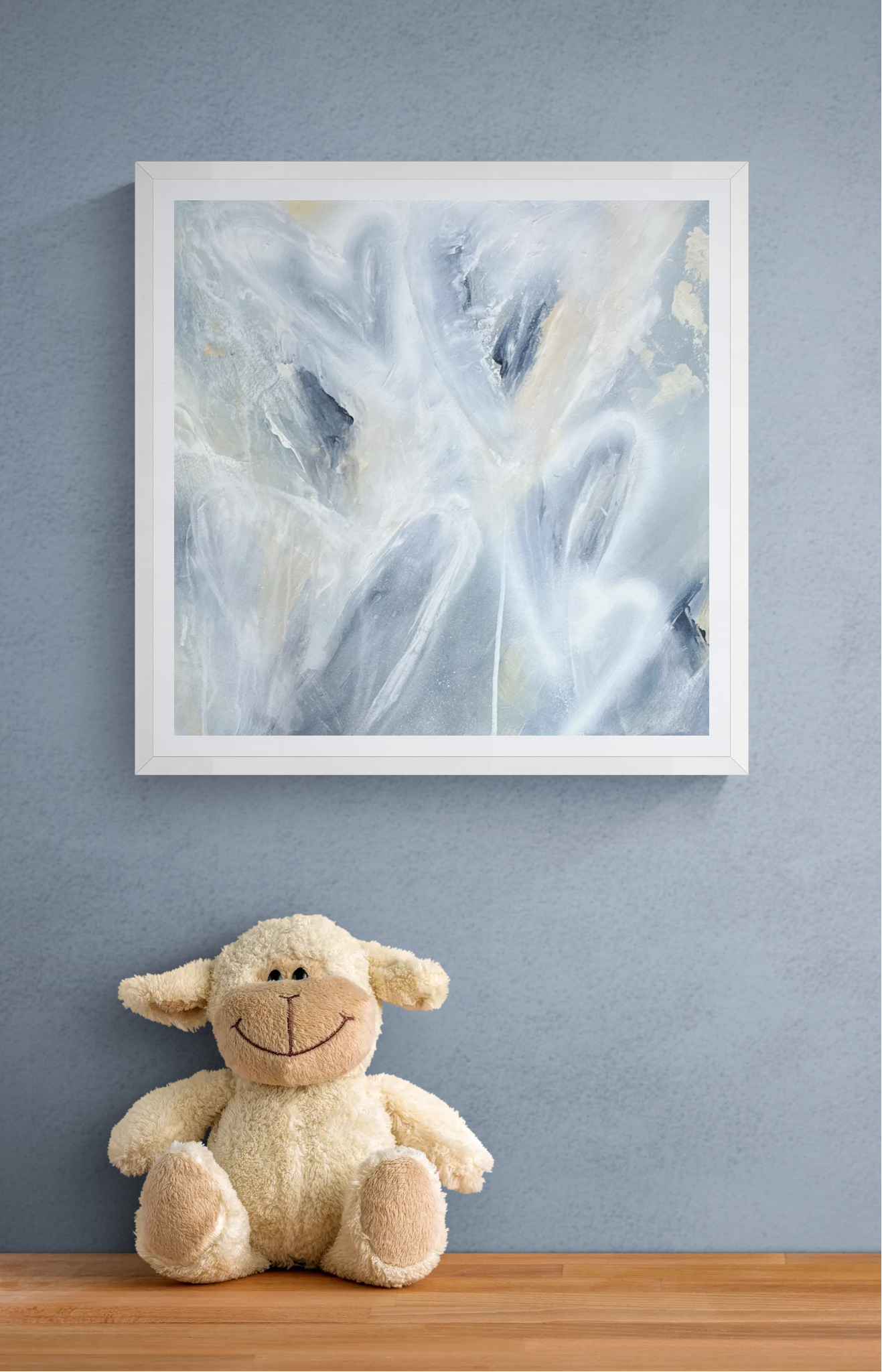 Blue abstract art hearts Cuddly sheep toy on shelf.png
