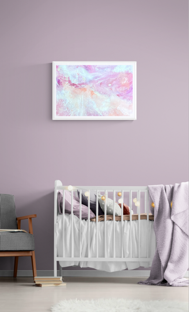 White wooden cot and chair in nursery.png