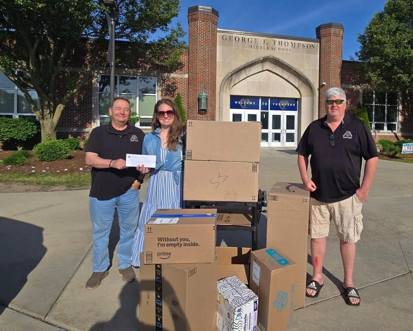 Geneva Masonic Lodge members making donations to St. Charles School District