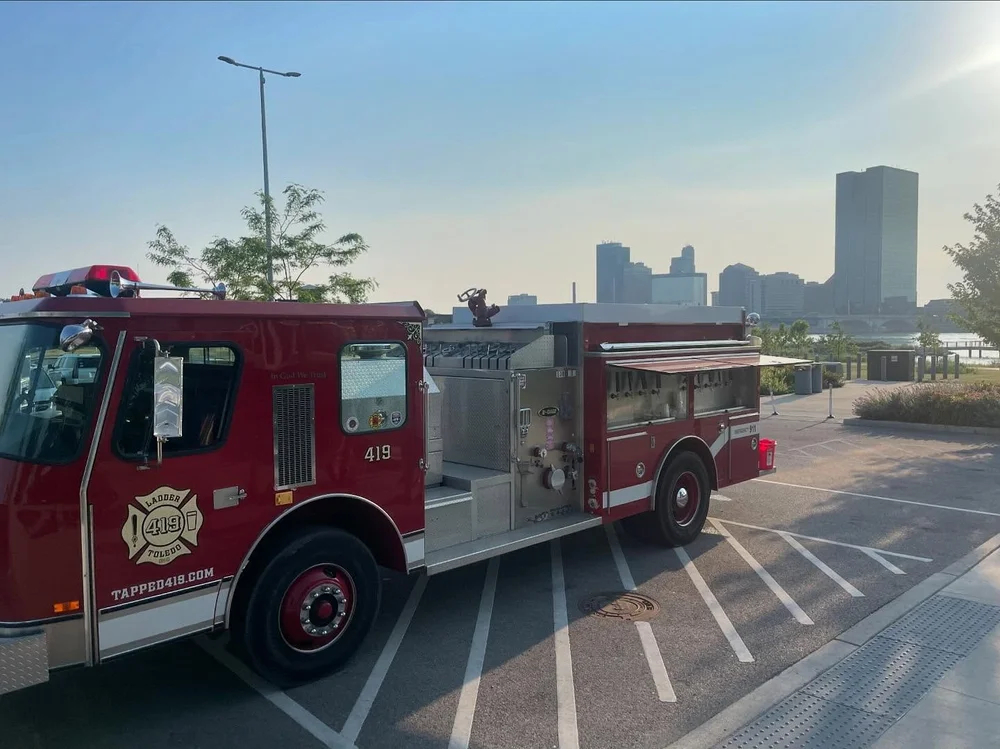 Ladder 419 fire truck parked on the Toledo riverfront