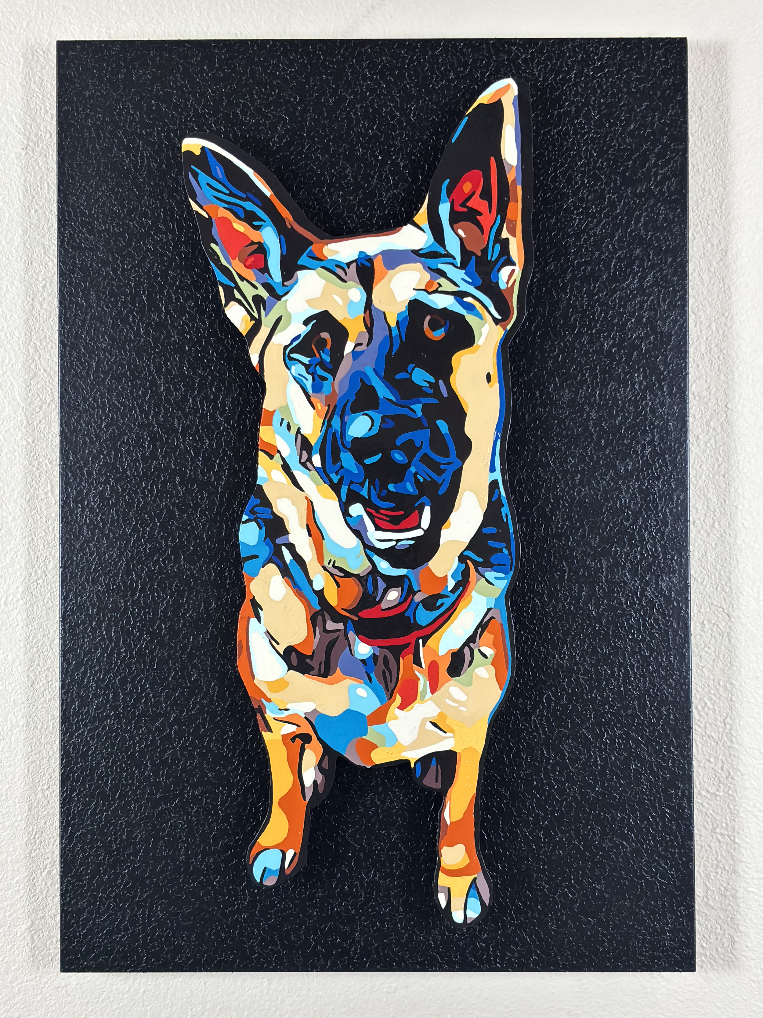 Colorful abstract painting of a French Bulldog, with bold and vibrant colors on a black background.