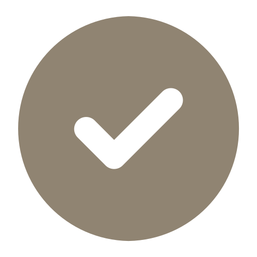 A checkmark inside a circle on a gray background, indicating completion or approval.