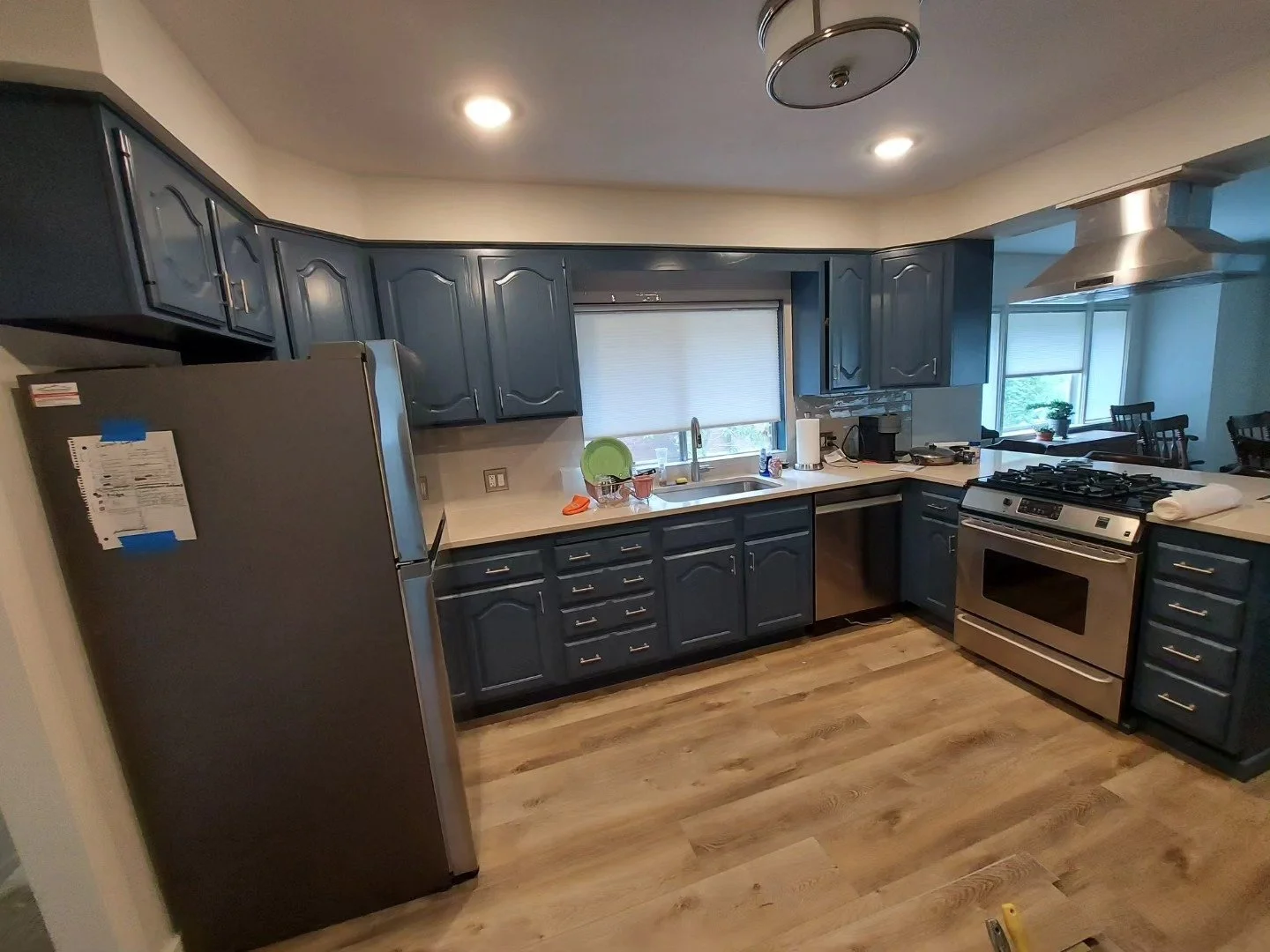 Old wood cabinets painted and new hardware