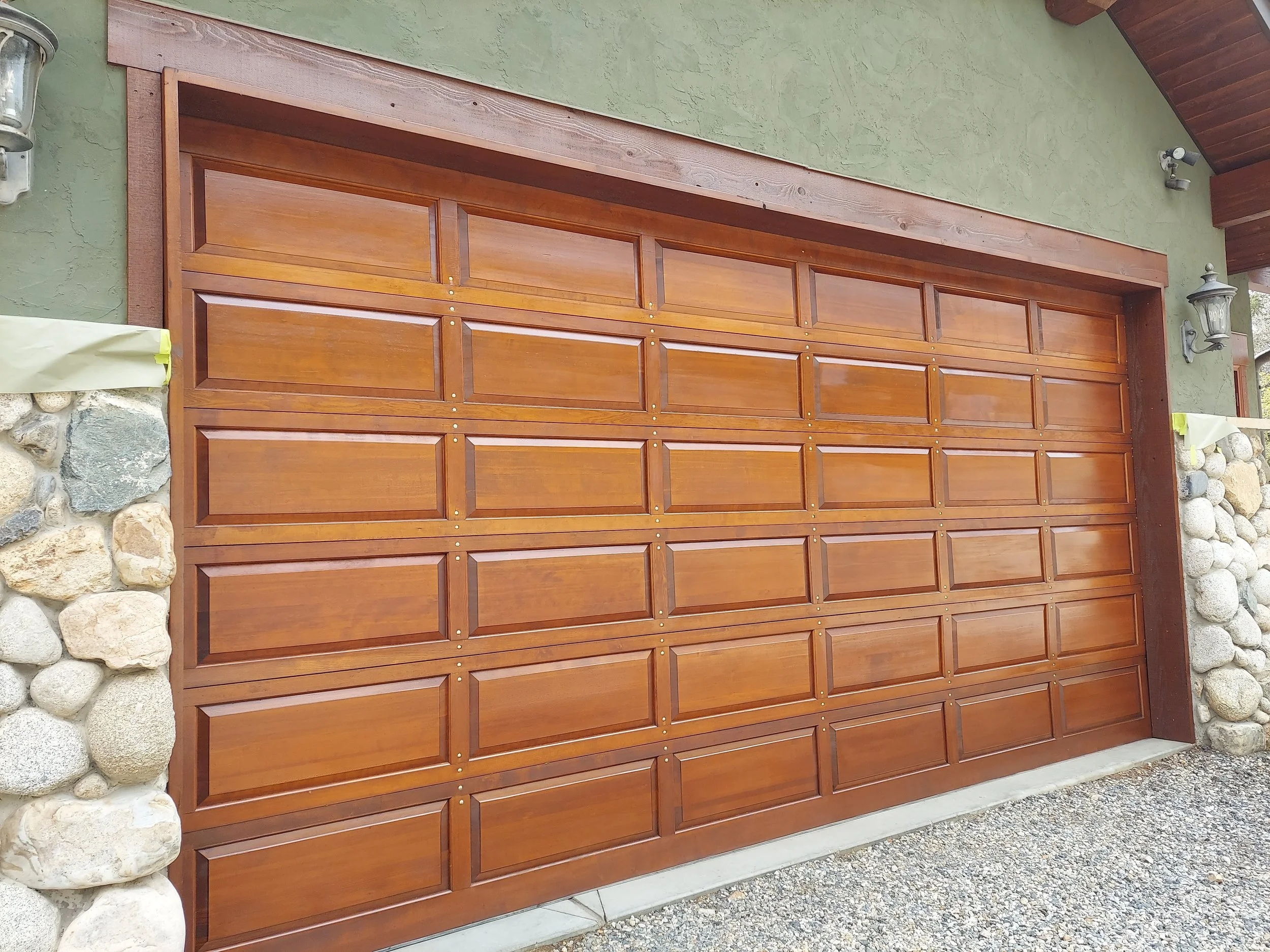 Wood garage door after staining