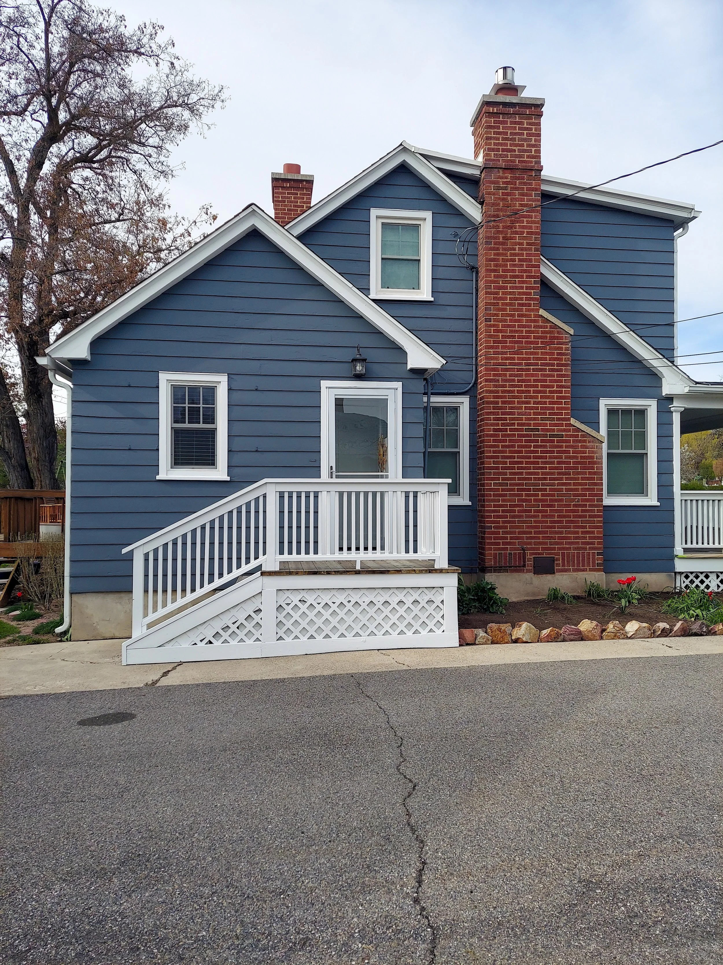 Exterior house after paint and deck sealing