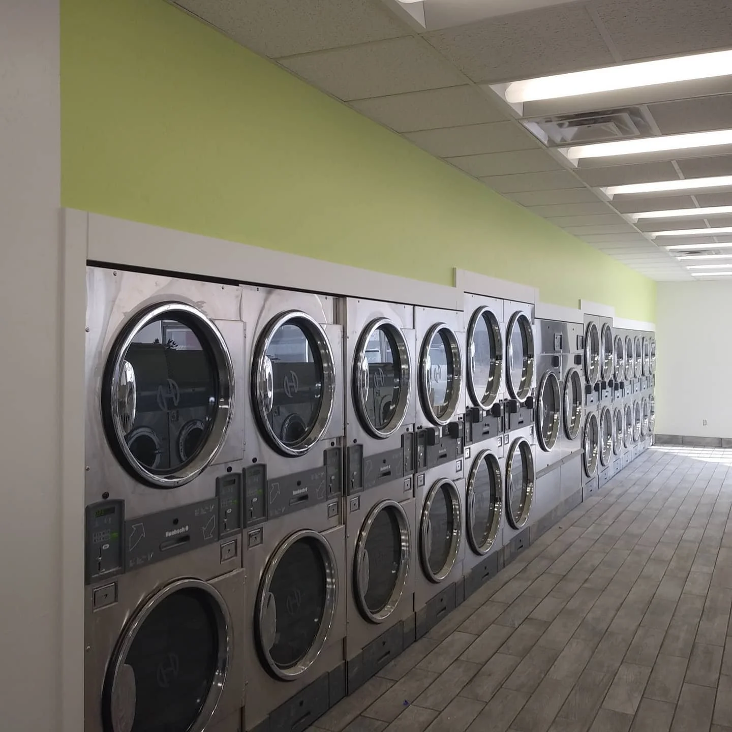 New paint and accent wall in laundry business