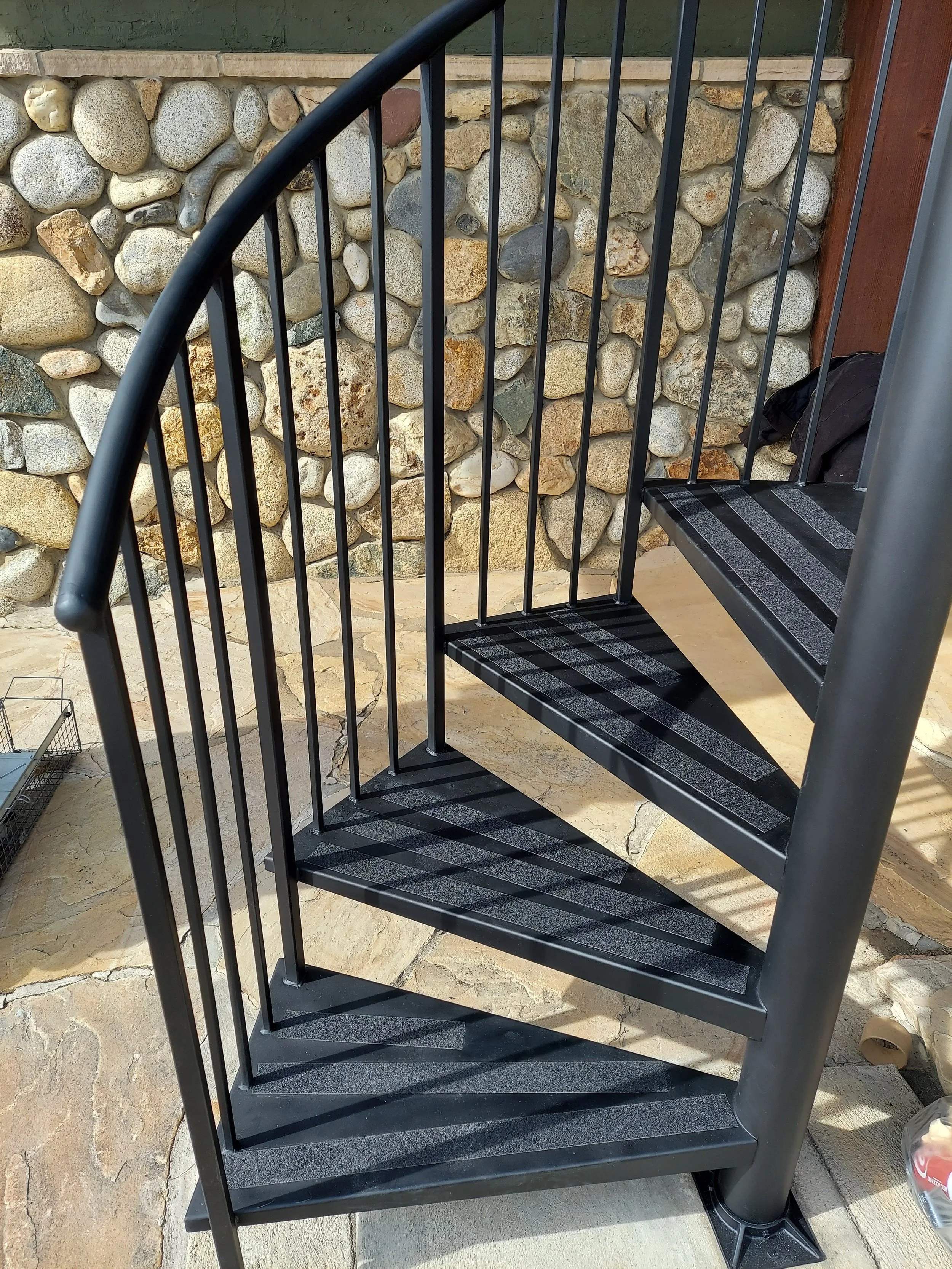 Metal stairs after sanding rust, priming and paint