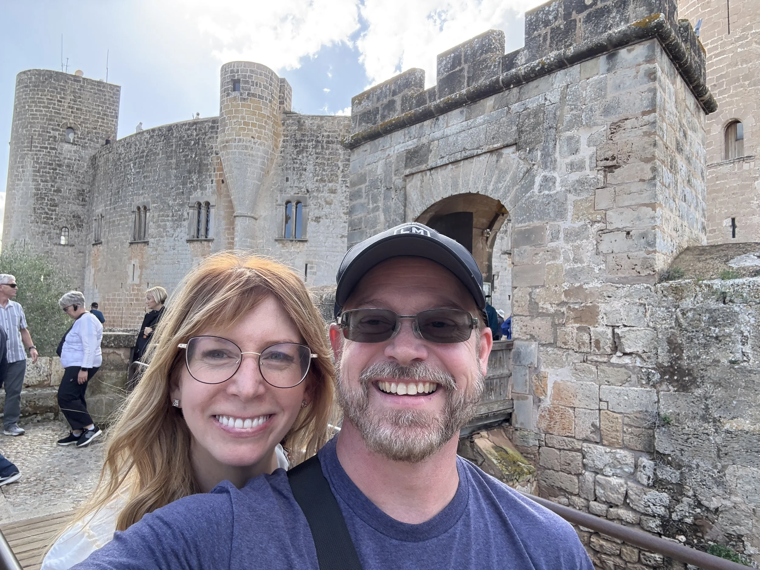 married couple taking seflie in europe