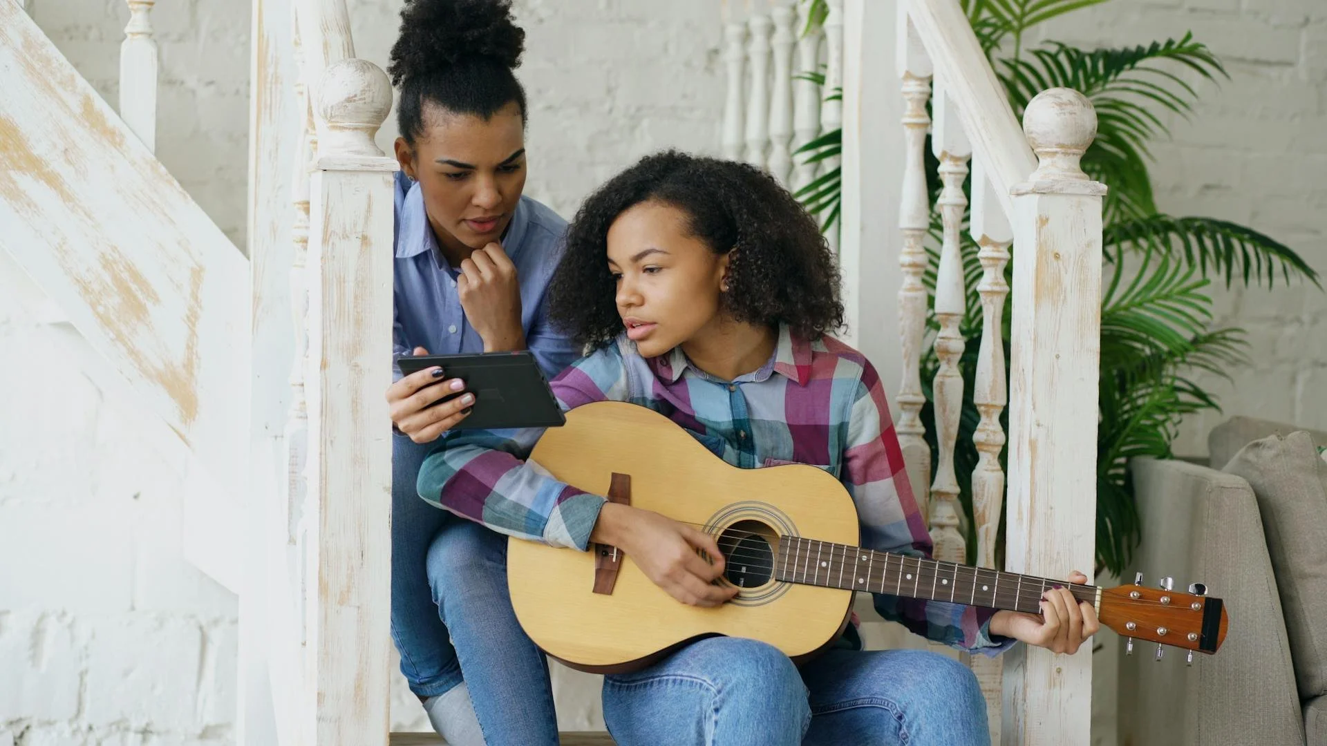 parent and teen with ADHD learning music together