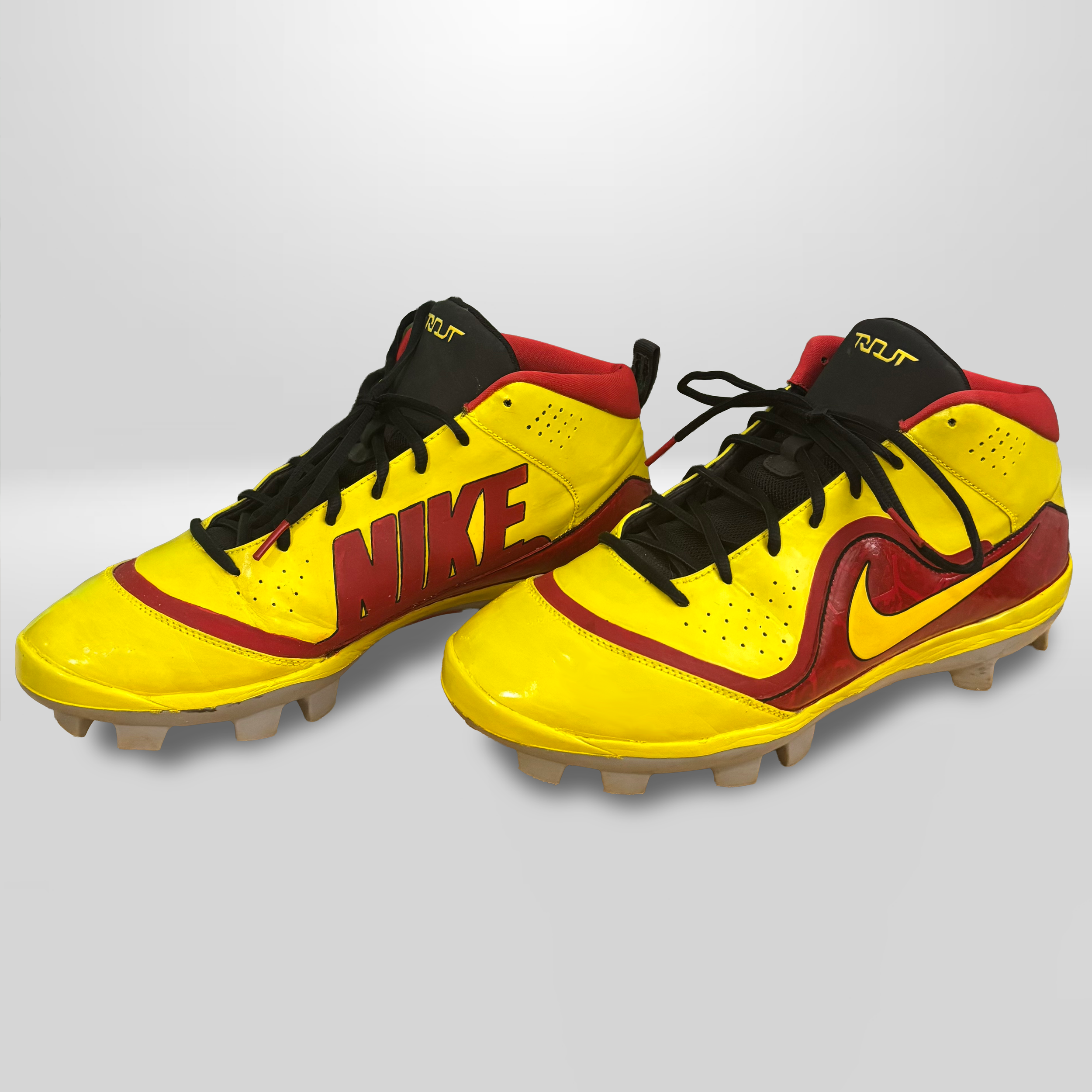 red & yellow cleats.png