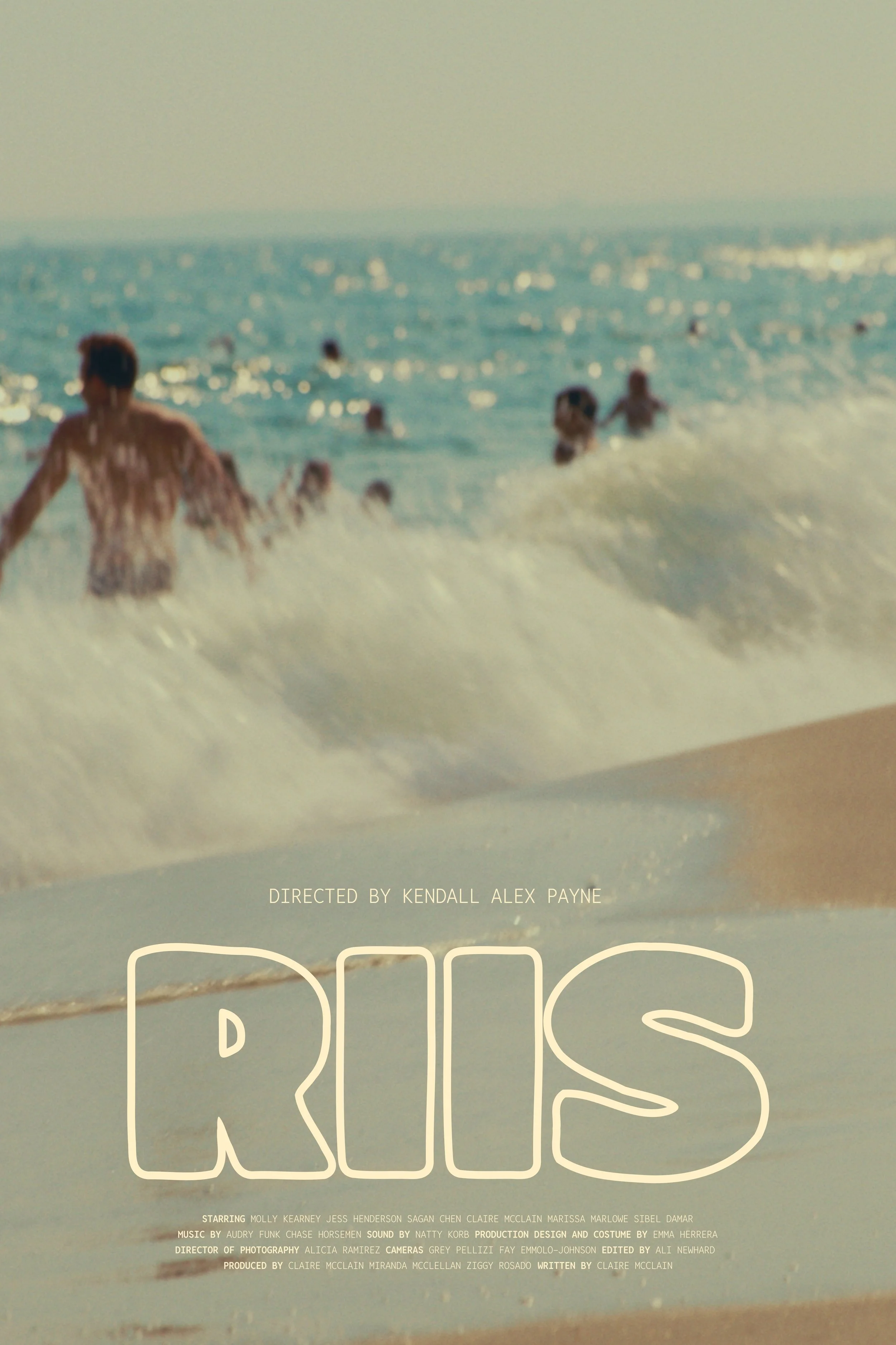 A beach scene with several people swimming and playing in the ocean waves, under a clear sky.
